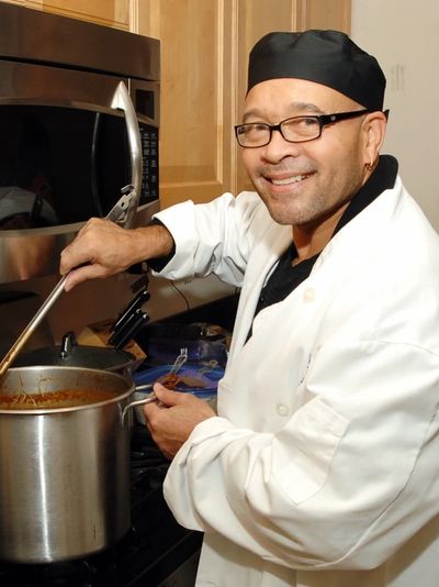 Simmering and tasting a cajun seasoned roux after addition of the meats, the condiments, the love.