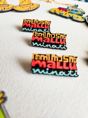 Malluminati Badge Pin