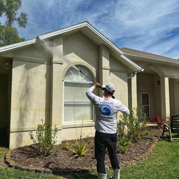Cleaning soffit with soft wash