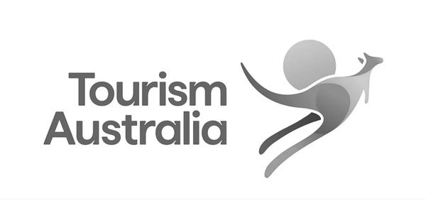 Logo of Tourism Australia with a kangaroo and sun graphic.