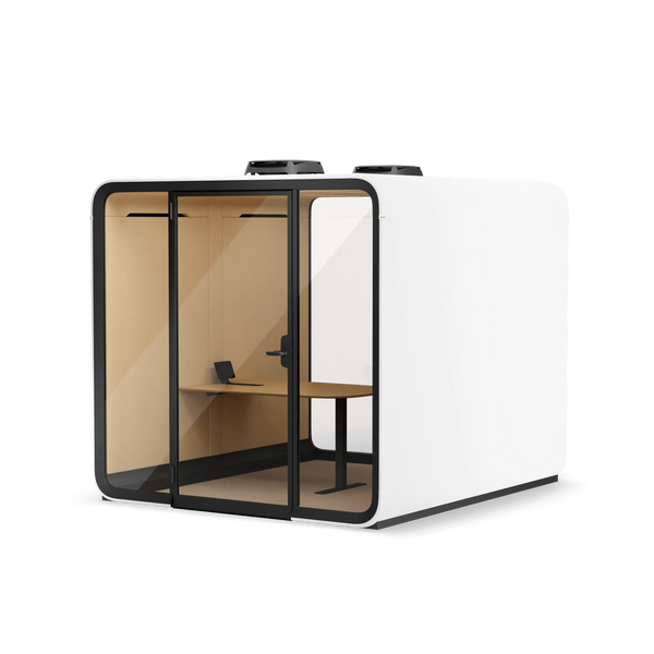 Modern, enclosed office pod with glass door and wooden interior desk.