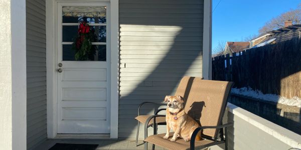 Annie on the back porch of her new home.
