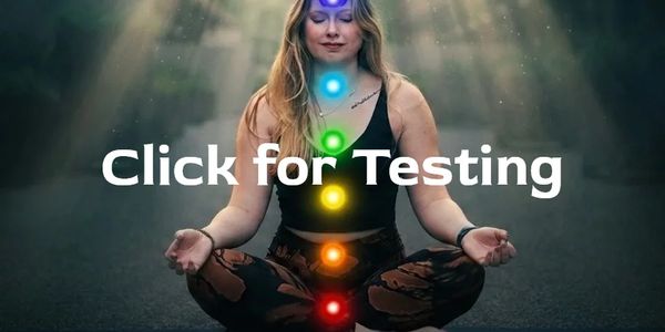 Woman meditating with colorful chakras glowing on her body.
