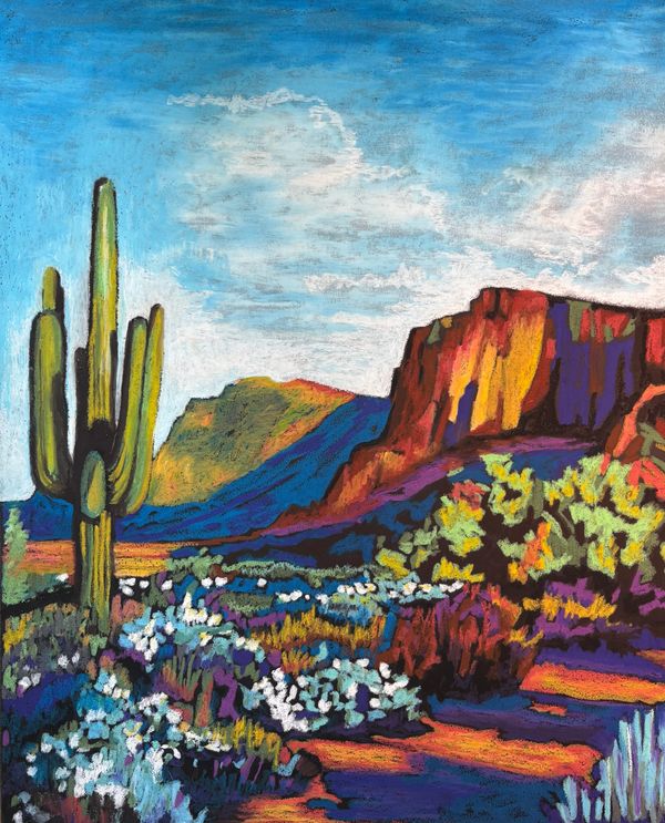 Vibrant desert landscape with cactus, wildflowers, and colorful cliffs under a bright sky.