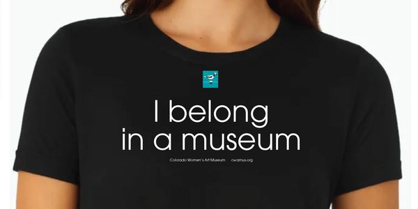 Colorado Women's Art Museum I belong in a museum t-shirt white text on black turquoise bird logo