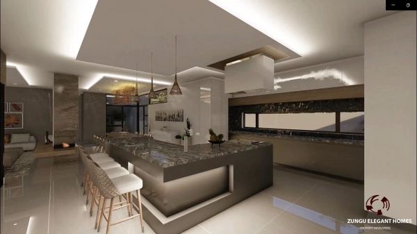 Modern kitchen with a large marble island and pendant lights.