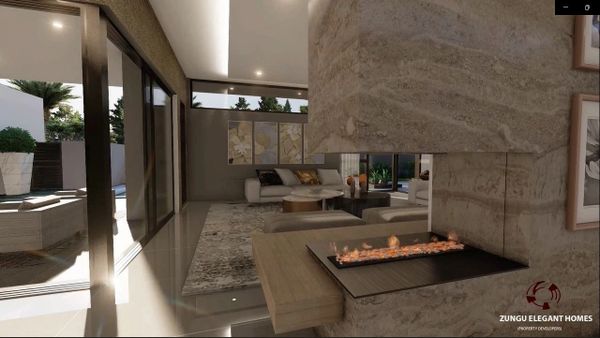 Modern living room with a sleek fireplace and large windows opening to an outdoor seating area.