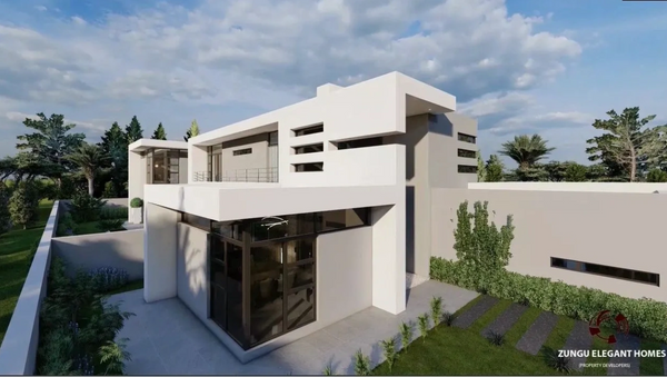 Modern white two-story house with large windows and surrounding greenery.