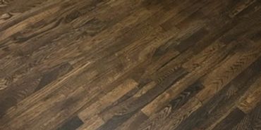 Top Notch Wood Floors Emerald Coast - Example of Perfect Cuts Around Protruding Walls