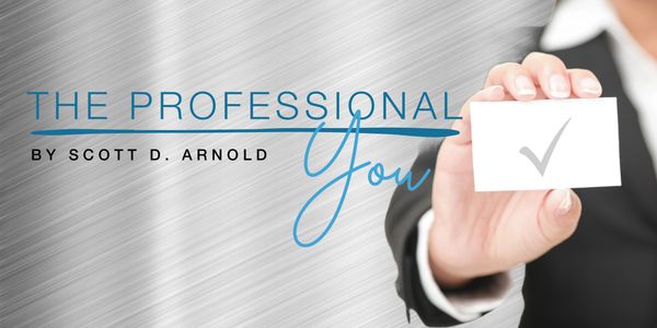 A professional holding a card with a checkmark symbol.