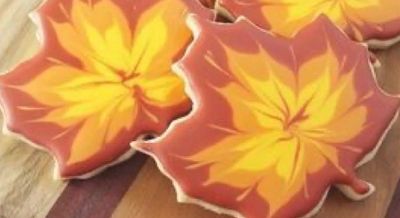 Fall decorated sugar cookie leaves.