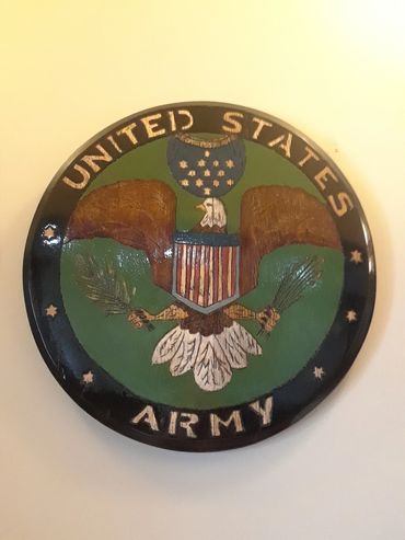 Bourbon Barrel United States Army $480.00 (21" x21") with stand.  Custom art and hand engraved 