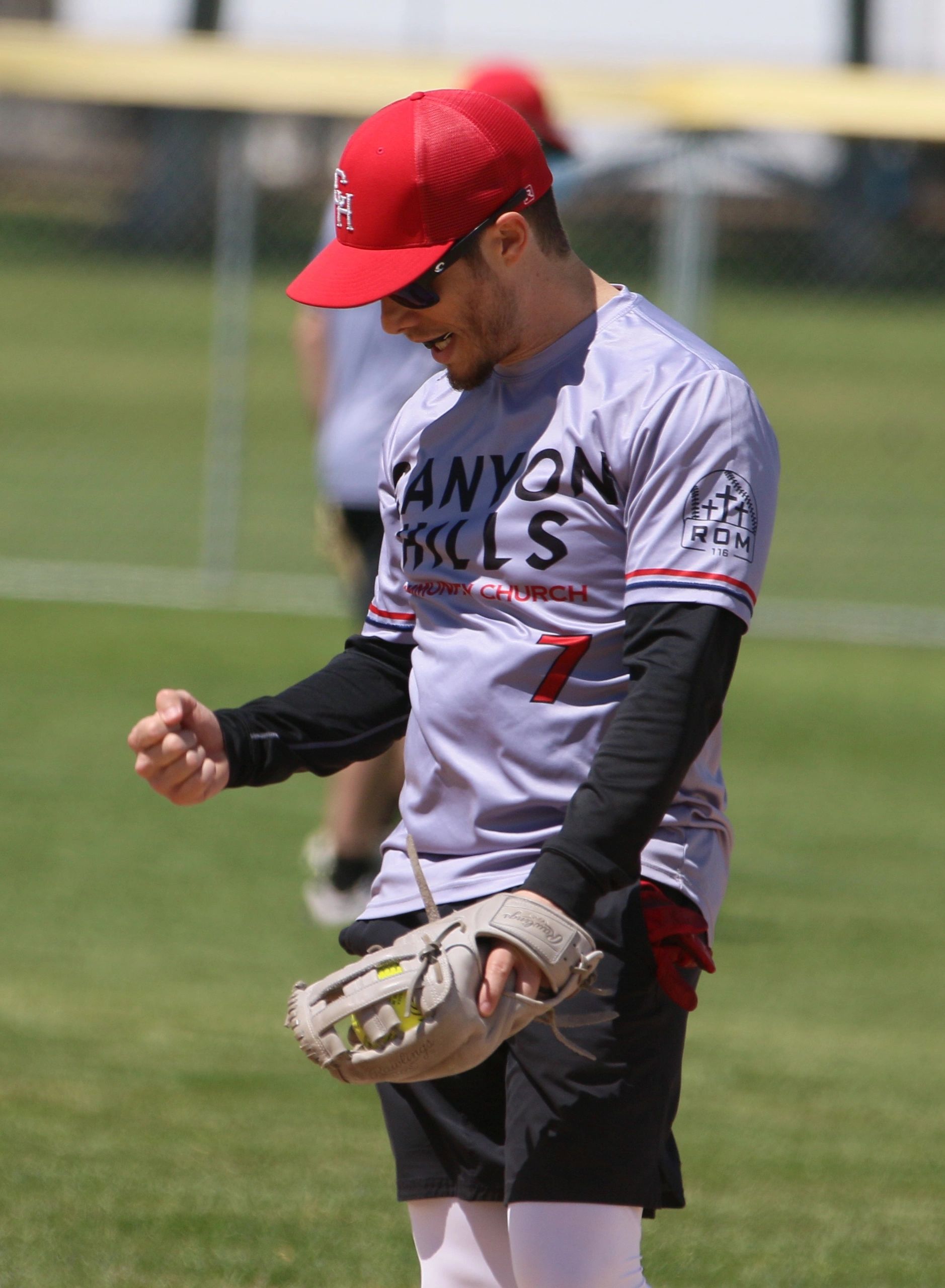Baseball player celebrating a successful play on the field.