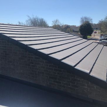 Tile Pitched Roof Refurbishment, and Single Ply Flat Roof Refurbishment in Penistone. 