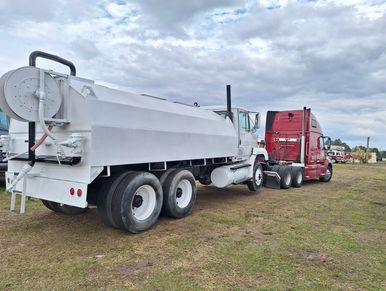 a truck towing another truck