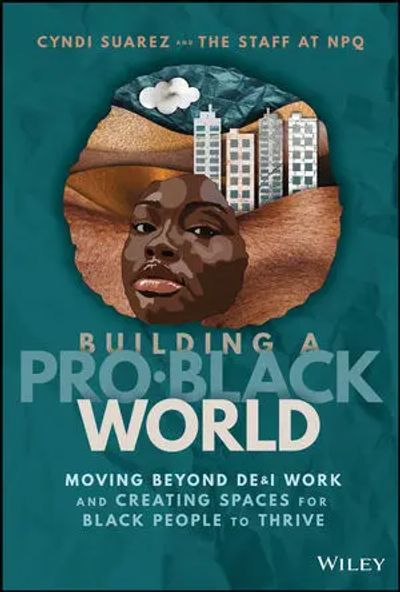 Book cover showing a Black face with buildings and nature inside the silhouette, titled 'Building a Pro-Black World'.