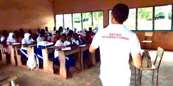 A volunteer teaching a class