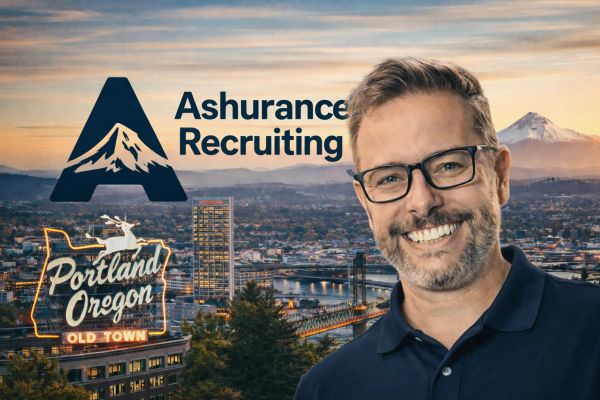 Smiling man with Ashurance Recruiting logo and Portland, Oregon cityscape at sunset.