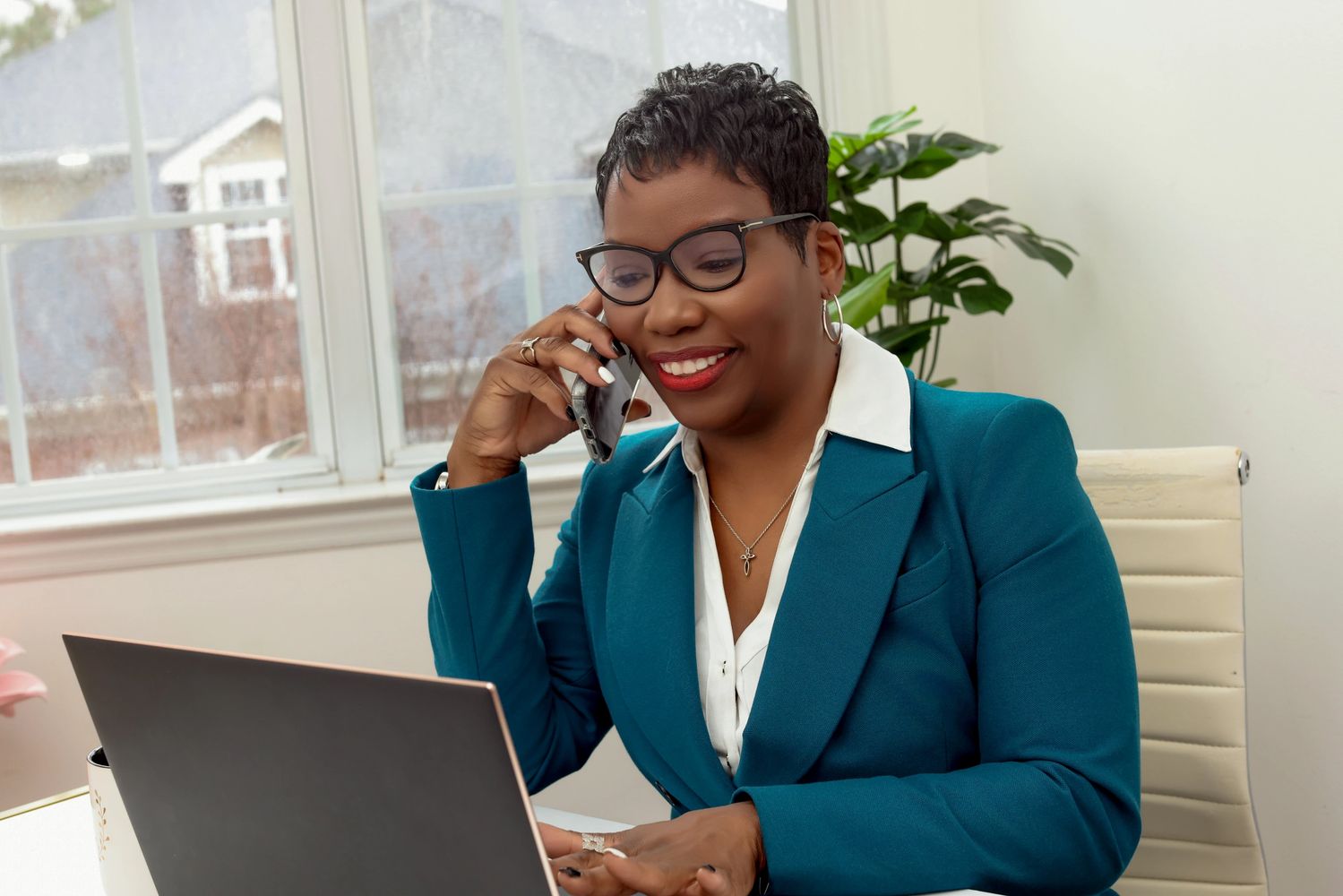 Vickie Pittman Callair office phone call at desk. 