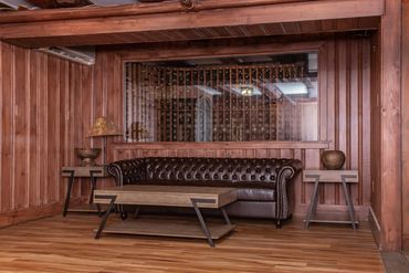 a view of the lounge area where the groom and groomsmen can relax in the tavern