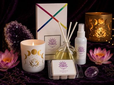 Handcrafted soy wax candle, reed diffuser, room spray and soy wax melts by Escentsual Arousal with lotus flowers, amethyst crystal and gift box.