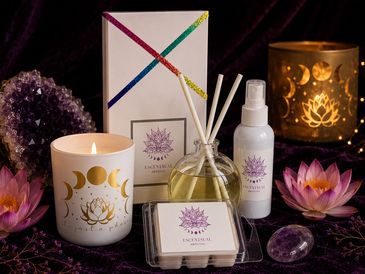 A serene arrangement of candles, diffuser, and crystals for relaxation.