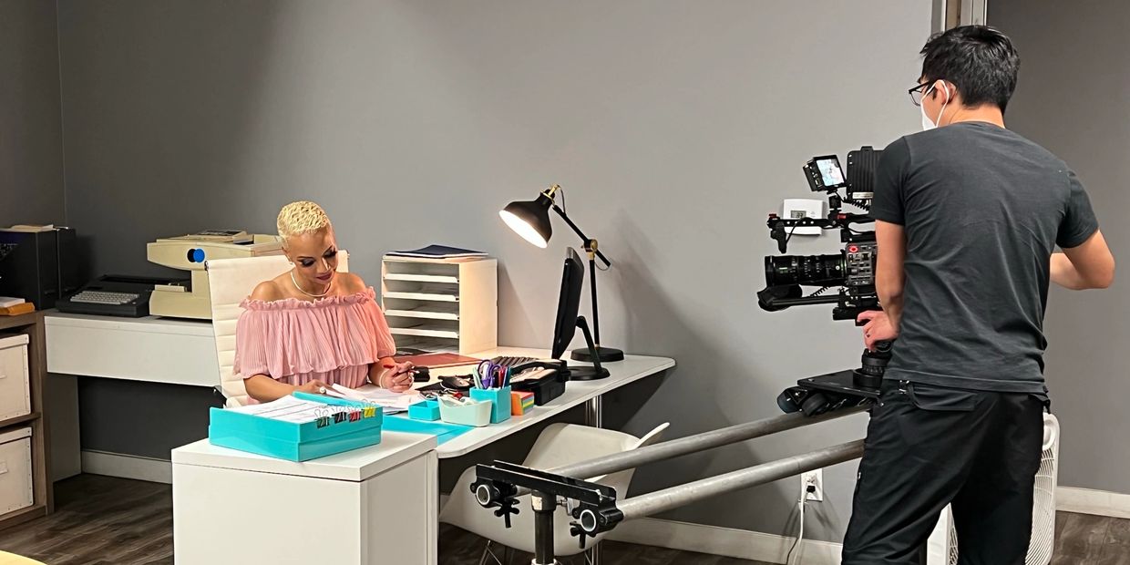 A video shooting with woman inside the office and read the file on the table