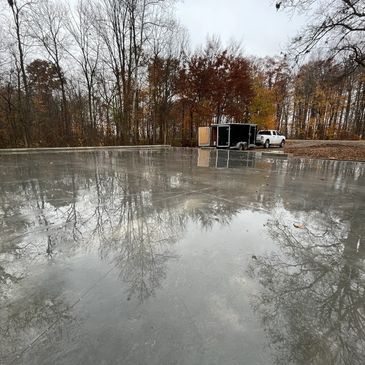 Poured and finished garage floor.