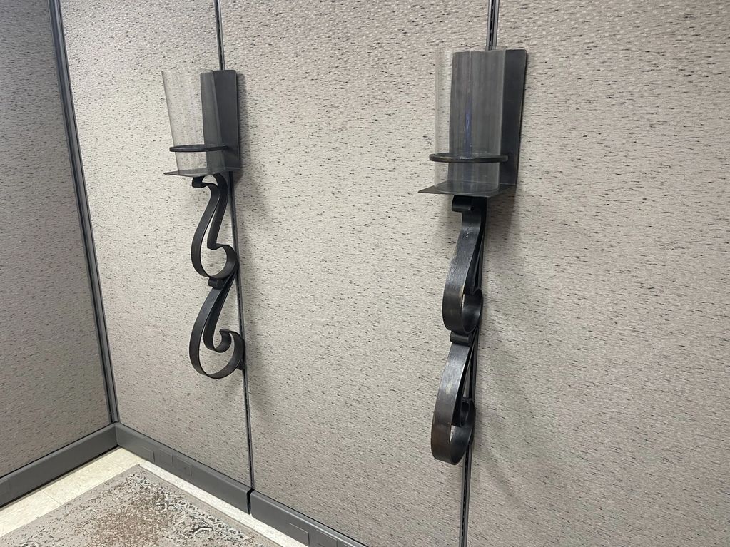 Heavey Metal Sconces with glass votives 8" deep. 7in wide, 42 tall. 
$100.00