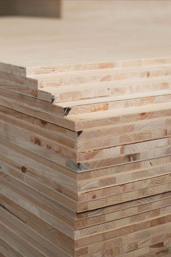 Stack of laminated wooden boards with smooth edges.