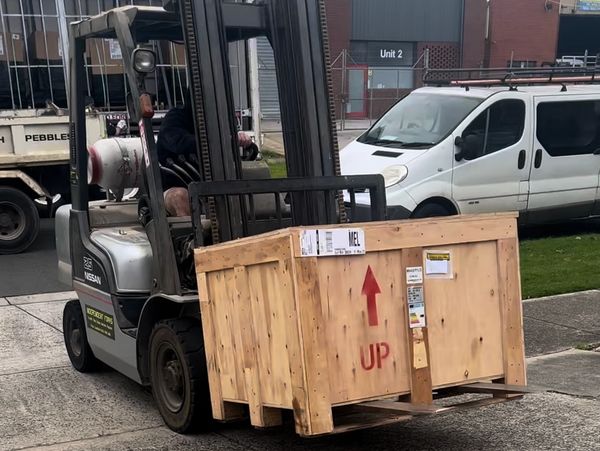 Pisca Prints first machines delivered and moved with a forklift.