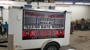 Banners mounted to advertising trailer