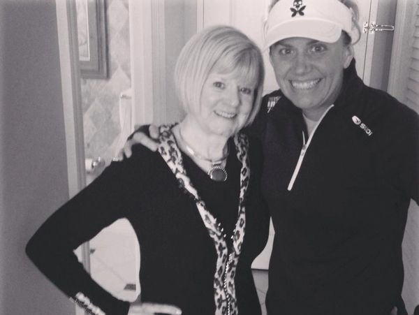 Black and white image of Ashley with a friend.