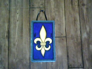 Fleur de lis purple on slate