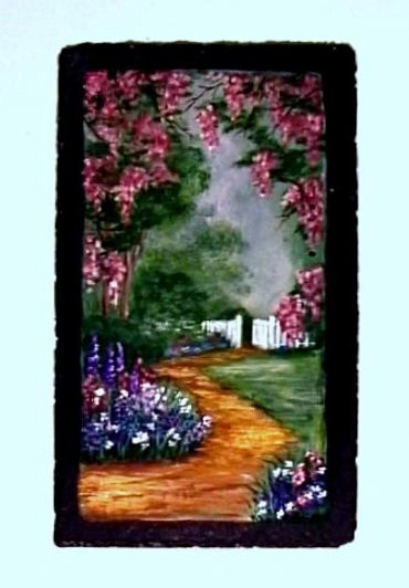 Flower garden to white fence on slate