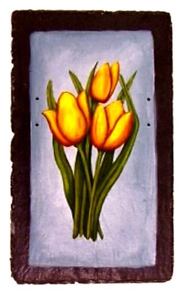 yellow tulips on slate