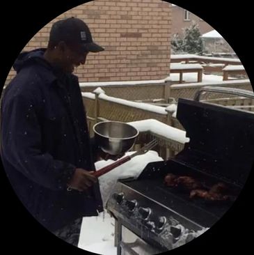Bryan with his BBQ in the freezing winter cold!
