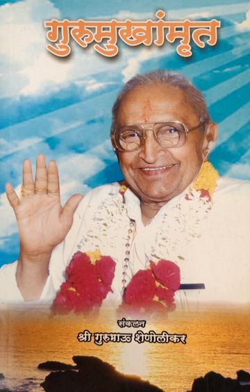 Smiling elderly man with flowers and raised hand gesture.