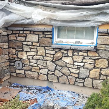 Cultured stone installed with a masonry sill 