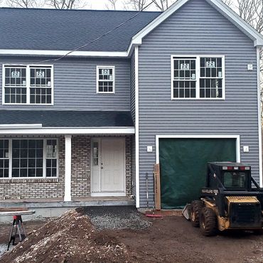 Vinyl siding and brick veneer