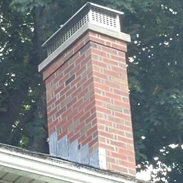 Chimney was rebuilt with quality brick that matched the existing below. It was also rebuilt to code 
