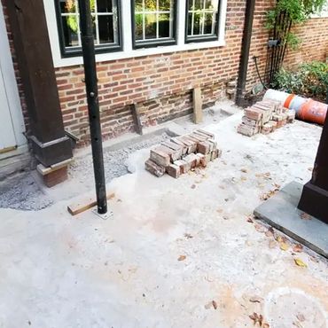 Brick inner leaf is exposed and out wall is shored