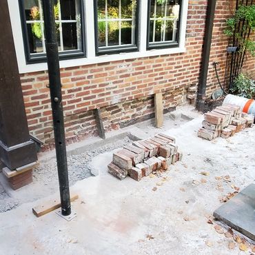 Foundation brick shelf is exposed