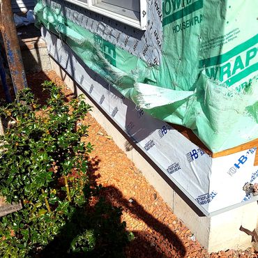 Flashing installed at the foundation base for moisture protection