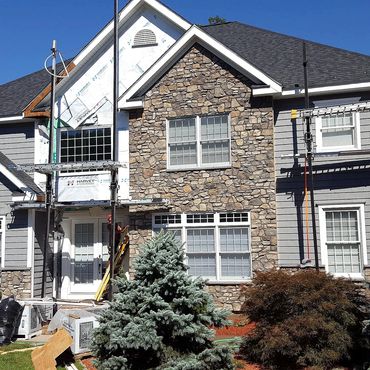 Stone from foundation to top of roof peak