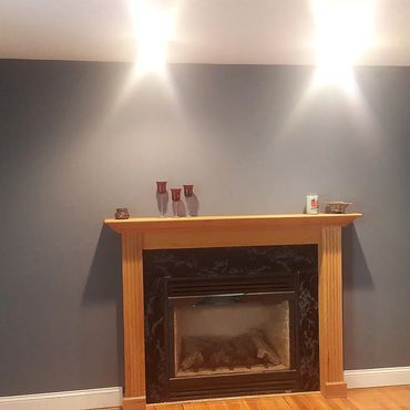 Fireplace with marble surround in need of update