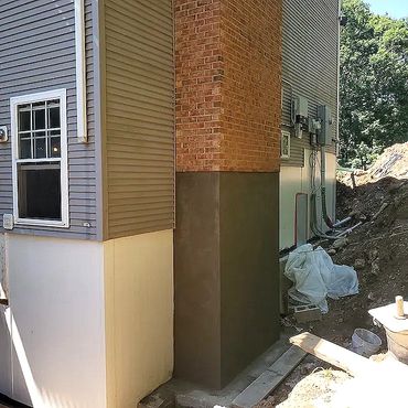 Final coat of plaster applied with a sponge float finish. The new foundation is ready for waterproof