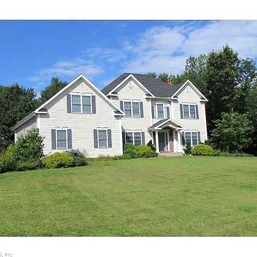 Stonecroft Lane Coventry - A 2700 + Sqft Colonial with a 3 car garage and a 2 flue masonry chimney w