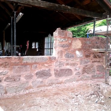 Brownstone is a sandstone meaning is less dense than granite or quartz. A softer mortar had to be us