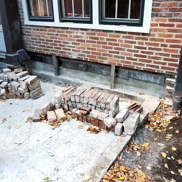 Exterior brick leaf shored in place